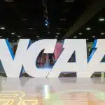 NCAA signage placed on the floor.