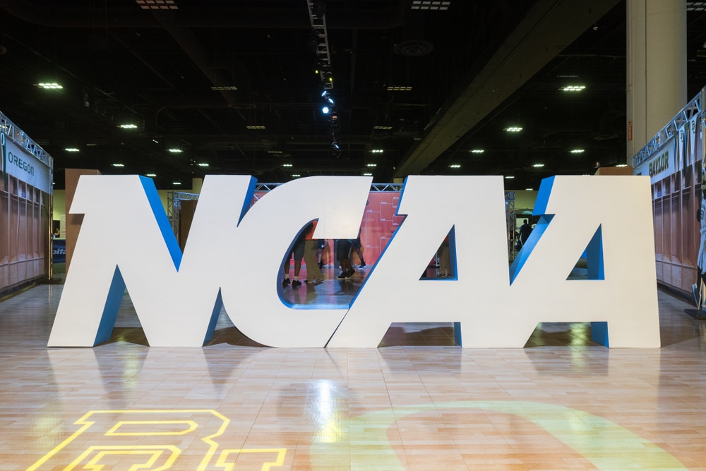 NCAA signage placed on the floor.