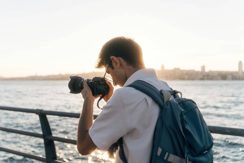 student taking a photo for the AAPT High School Physics Photo Contest