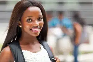 Female student smiling at the camera.