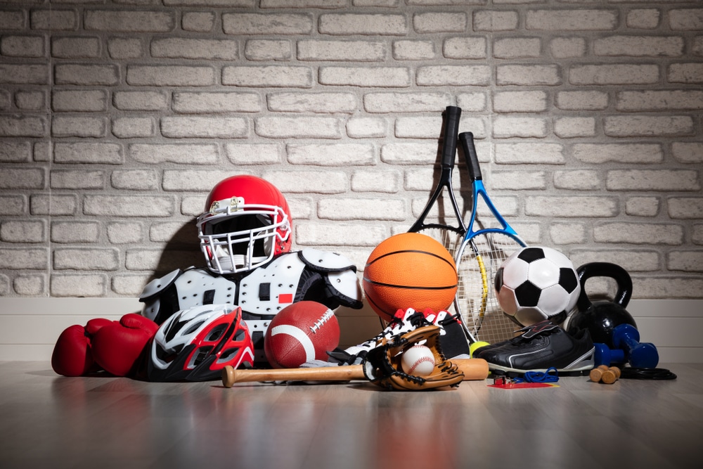 View of Sports equipments stack on the wall.