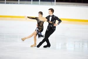 a male and female figure skating