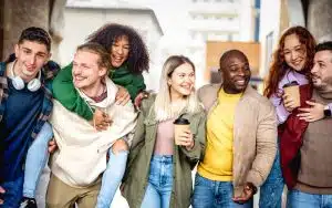 Multiracial students talking while walking.