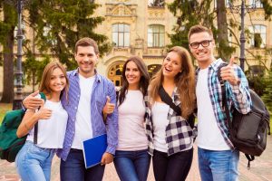 Group of students smiling at the camera.