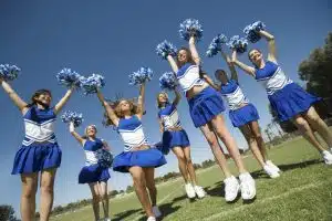 a cheerleading team cheering