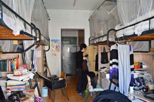 A man with his traditional-style dorms