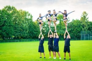 a group of cheerleaders practicing