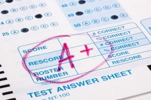 Close-up photograph of a perfect grade on a test.