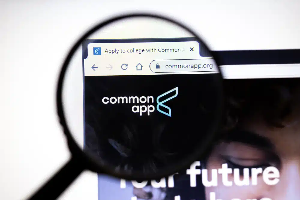 Common App website page. Commonapp.org logo on display screen, Illustrative Editorial.