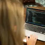 A young girl participating in one of the best data science programs for high school students.