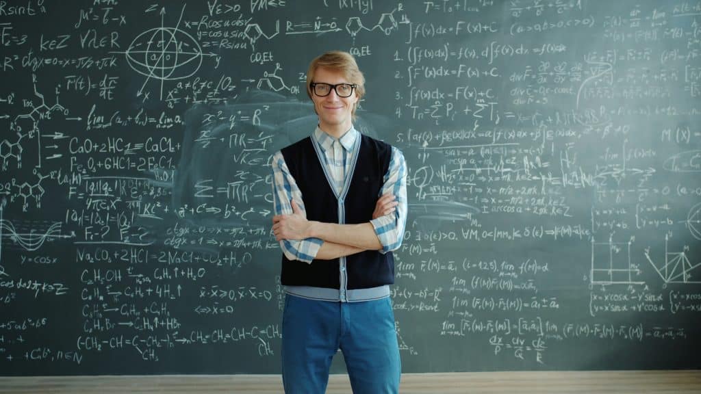 A male student studying in one of the best colleges for physics.
