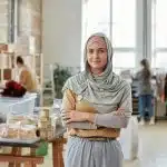 a student in hijab doing volunteer works for the presidential volunteer service awards