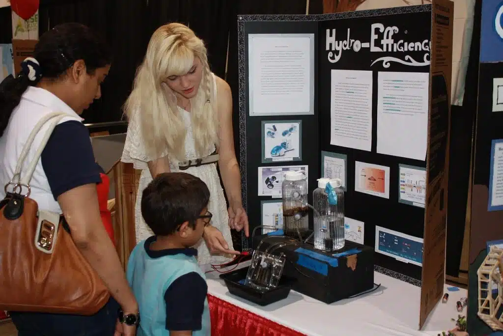 student presenting science fair project