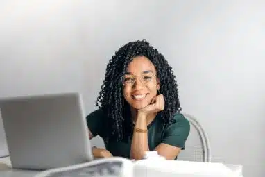 Girl in green shirt smiling