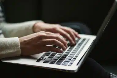 A student viewing their Duke likely letter on their laptop.
