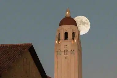 Hoover Tower at Stanford University under a full moon, symbolizing academic excellence across the most popular majors at Stanford.