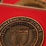 A picture of the Rensselaer Medal that students receive when they qualify.