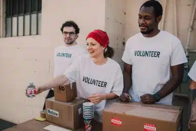 people doing volunteer activities with red cross youth