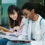 two female students who are members of national honor society