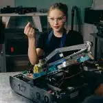 students doing some robotics project for the robotics summer programs for high school students