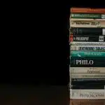 A stack of philosophy books used by students in the best colleges for philosophy.