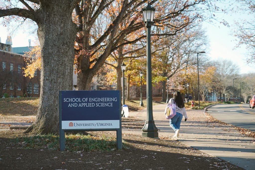 Student walking near the School of Engineering and Applied Science at the University of Virginia, showing where UVA is located in Charlottesville, Virginia.