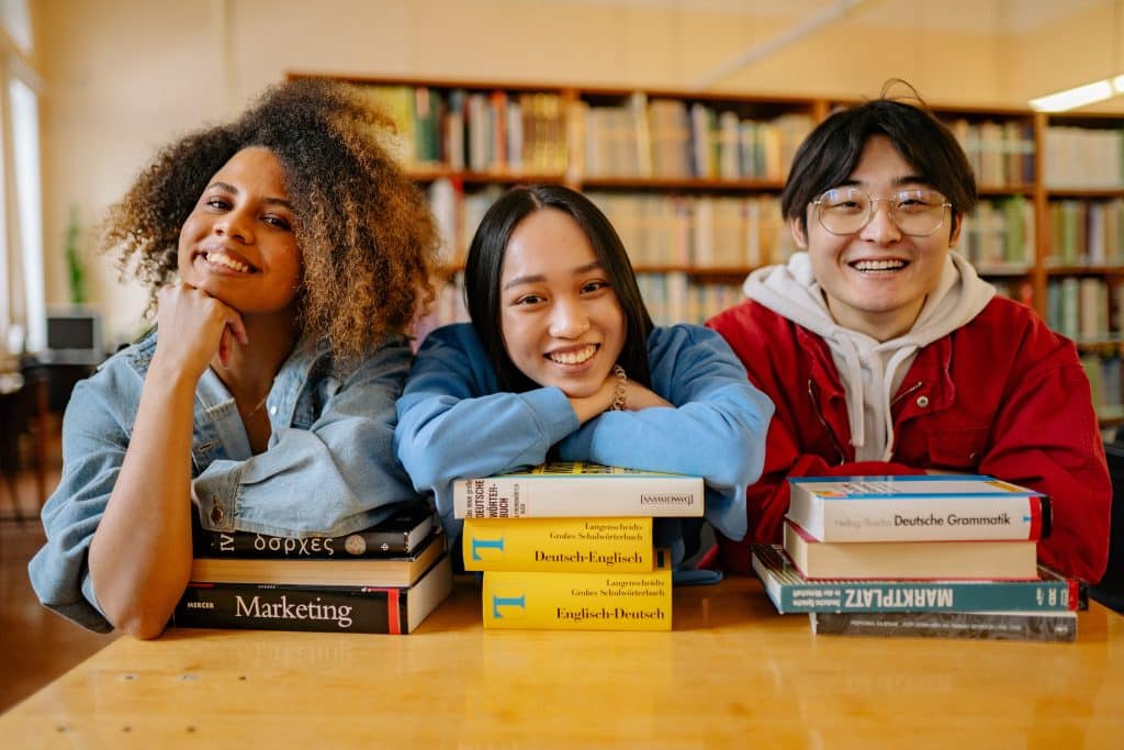 3 students smiling about the smith college acceptance rate