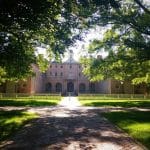 William & Mary acceptance rate highlighted by the historic Wren Building and tree-lined campus walkway at William & Mary in Williamsburg, Virginia.