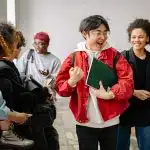students in the lobby celebrating after learing the uc merced acceptance rate