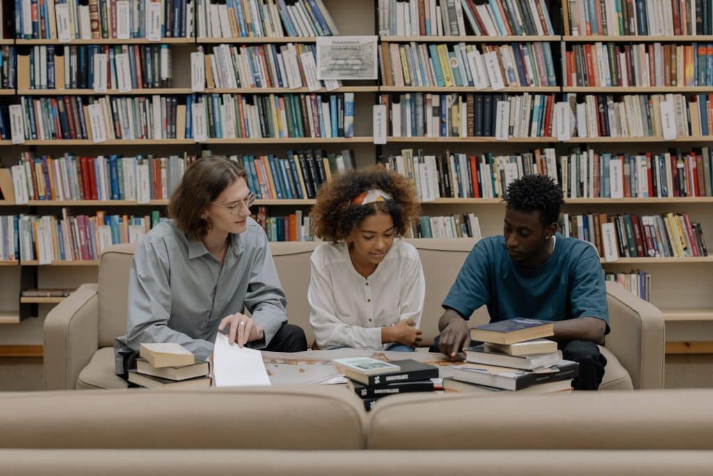 students reading in the library for the vassar college acceptance rate